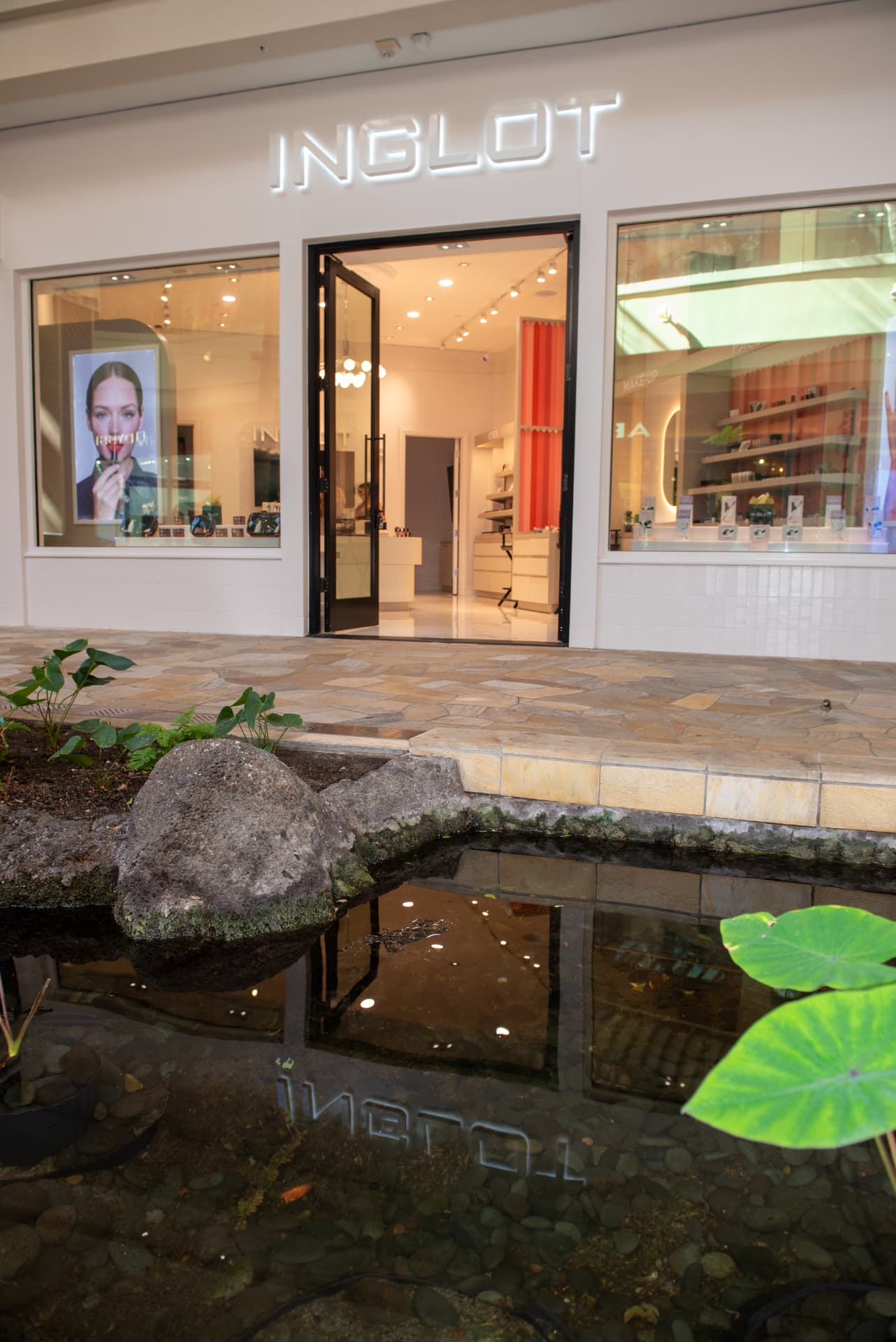INGLOT International Market Place storefront and pond